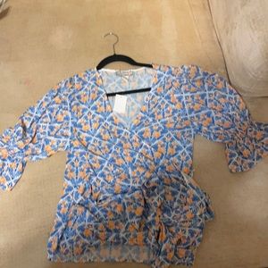 Wrap around blouse. Brand new